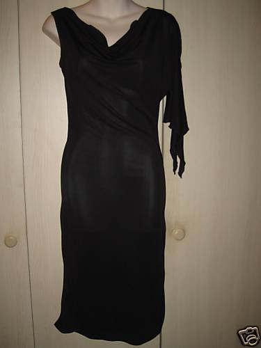Preview of the first image of Sexy Clingy Black Dress By KIT Size UK 8,10 or small 12.