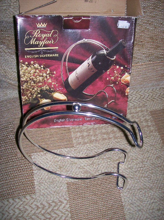 Preview of the first image of Silverware Tarnish Resistant wine holder / handle.