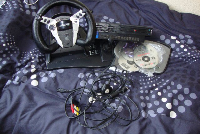 Preview of the first image of PS2 WITH MANY ACCESSORIES..