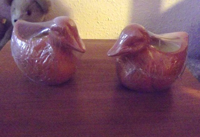 Preview of the first image of Citronella Candles in Decorative Terracotta Ducks.