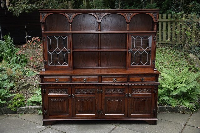 Preview of the first image of OLD CHARM TUDOR BROWN DRESSER BASE SIDEBOARD DISPLAY CABINET.