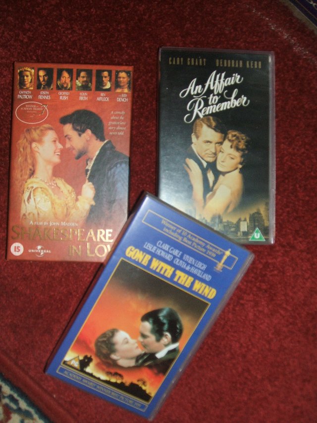 Preview of the first image of 3 VHS films, shakespeare in love gone with the wind etc.