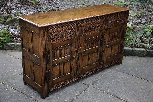 Preview of the first image of CARVED OAK SIDEBOARD WELSH DRESSER BASE CABINET CUPBOARD..