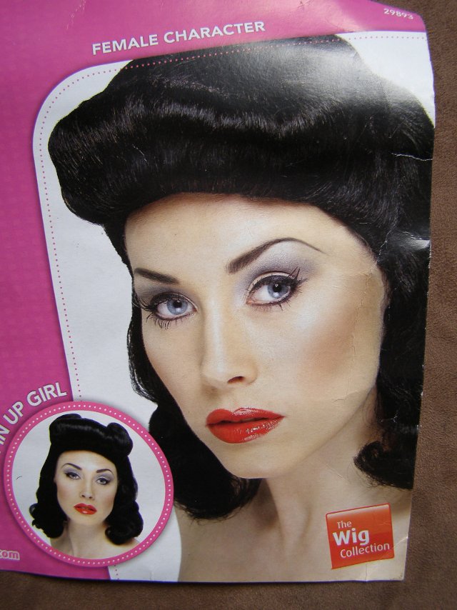 Preview of the first image of 1940's pin up girl black wig (Incl P&P).