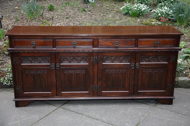 Preview of the first image of OLD CHARM TUDOR BROWN DRESSER BASE CUPBOARD SIDEBOARD..