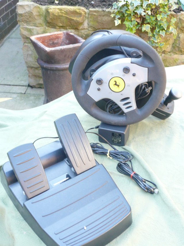 Preview of the first image of PlayStation 2 Steering wheel and foot pedal.