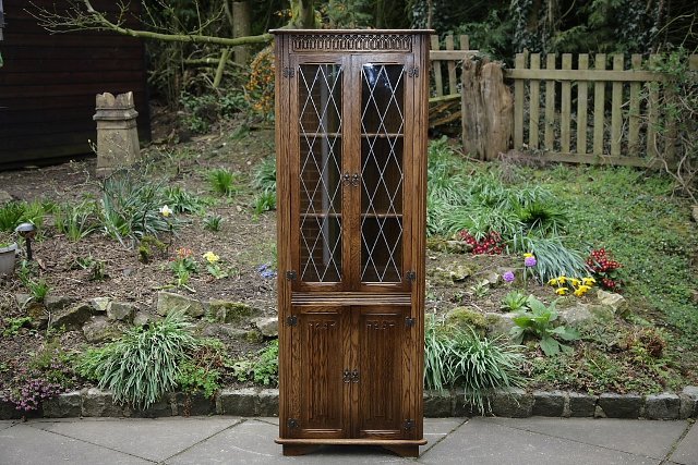 Preview of the first image of OLD MILL CHARM OAK CORNER CABINET DISPLAY CUPBOARD SHELVES..