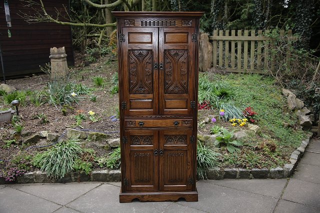 Preview of the first image of OLD CHARM LIGHT OAK DRINKS COCKTAIL WINE CABINET CUPBOARD..