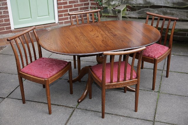 Preview of the first image of ERCOL ELM FRUITWOOD DINING SET CHESTER TABLE AND FOUR CHAIRS.