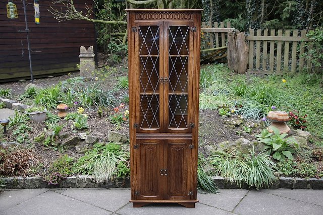 Preview of the first image of OLD MILL CHARM OAK CORNER CABINET DISPLAY DRESSER CUPBOARD.