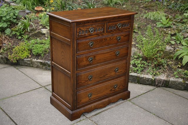 Preview of the first image of OLD CHARM WOOD BROS LIGHT OAK TALL CHEST OF DRAWERS..