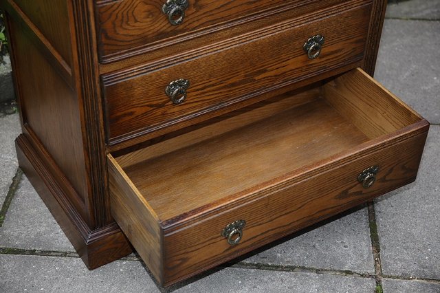 Image 10 of OLD CHARM WOOD BROS LIGHT OAK TALL CHEST OF DRAWERS.