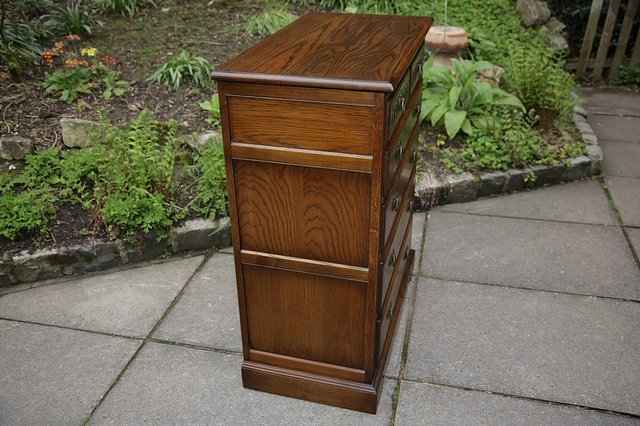 Image 15 of OLD CHARM WOOD BROS LIGHT OAK TALL CHEST OF DRAWERS.