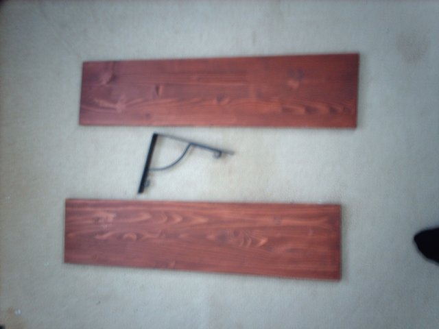 Preview of the first image of wood wall shelves with black metal stylish brackets.