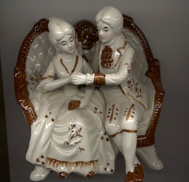 Preview of the first image of COUPLE IN PERIOD DRESS SEATED BROWN/WHITE.