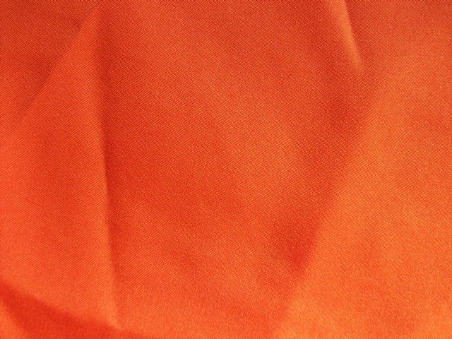 Preview of the first image of ORANGE PLAIN WOVEN SILKY FEEL FABRIC 156x108cms **NEW**.