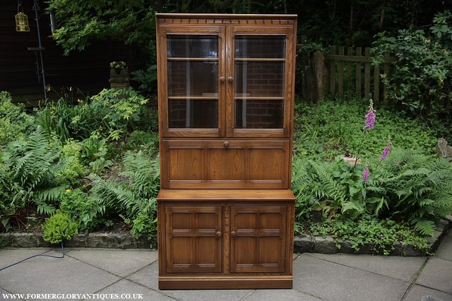 Preview of the first image of ERCOL GOLDEN DAWN DRINKS DISPLAY CABINET BOOKCASE CUPBOARD..