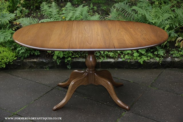 Preview of the first image of ERCOL ELM GOLDEN DAWN CHESTER PEDESTAL DINING KITCHEN TABLE..