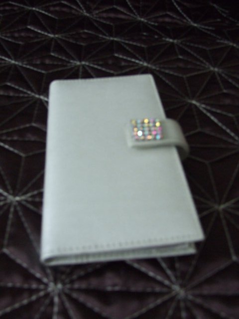 Preview of the first image of White Leather Address Book.