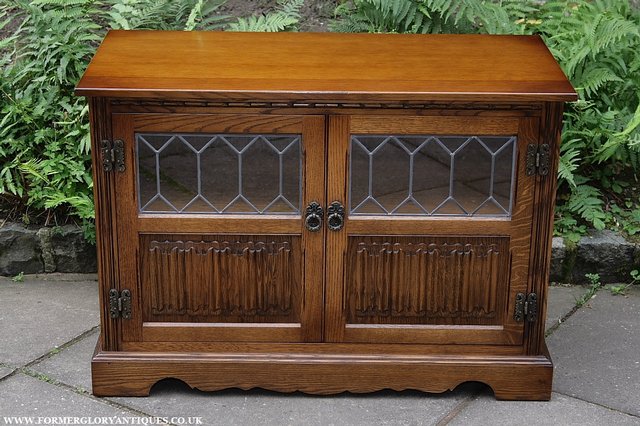 Preview of the first image of OLD CHARM LIGHT OAK T.V HI-FI DVD CABINET CUPBOARD SIDEBOARD.