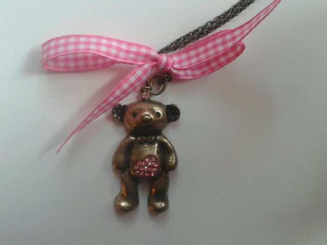 Preview of the first image of BEAUTIFUL BEAR AND RIBBON NECKLACE.