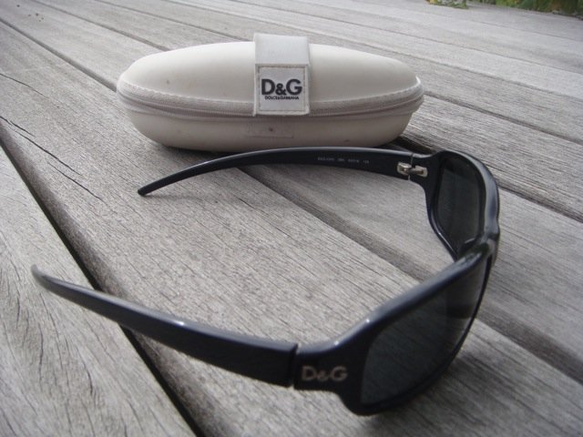 Preview of the first image of Dolce and Gabbana Black Rimmed Sunglass's.