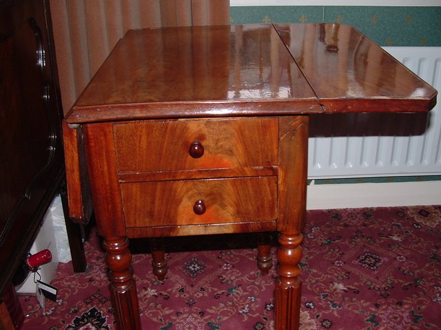 Preview of the first image of Antique Sewing Table with secret drawer.
