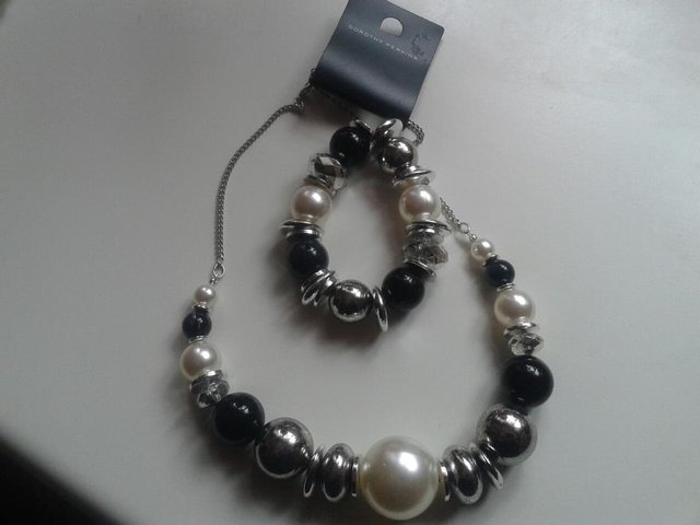 Preview of the first image of Black & white necklace set by Dorothy Perkins.
