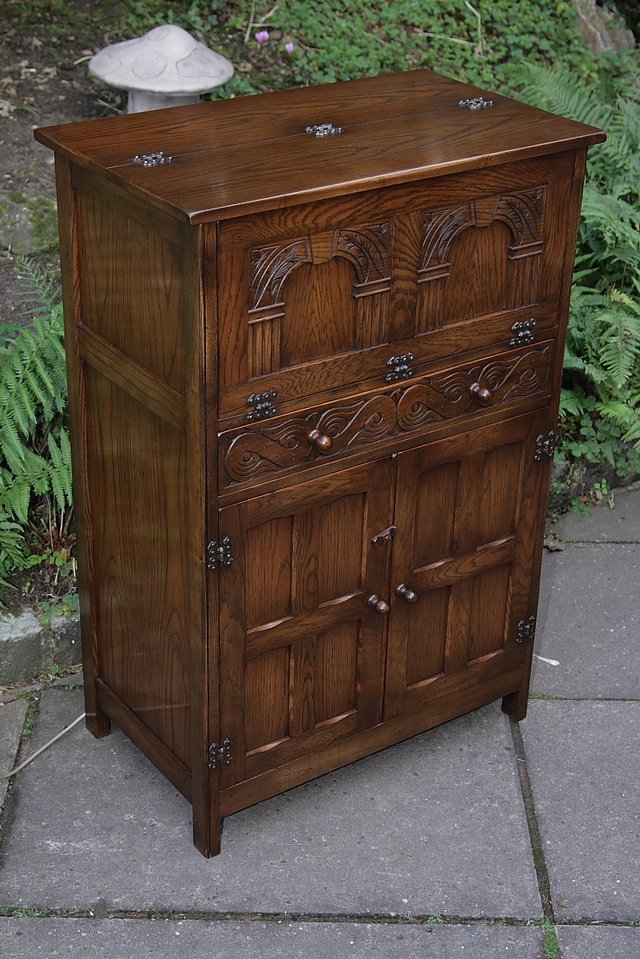 Preview of the first image of BEVAN FUNNELL REPRODUX OAK DRINKS COCKTAIL WINE CABINET.