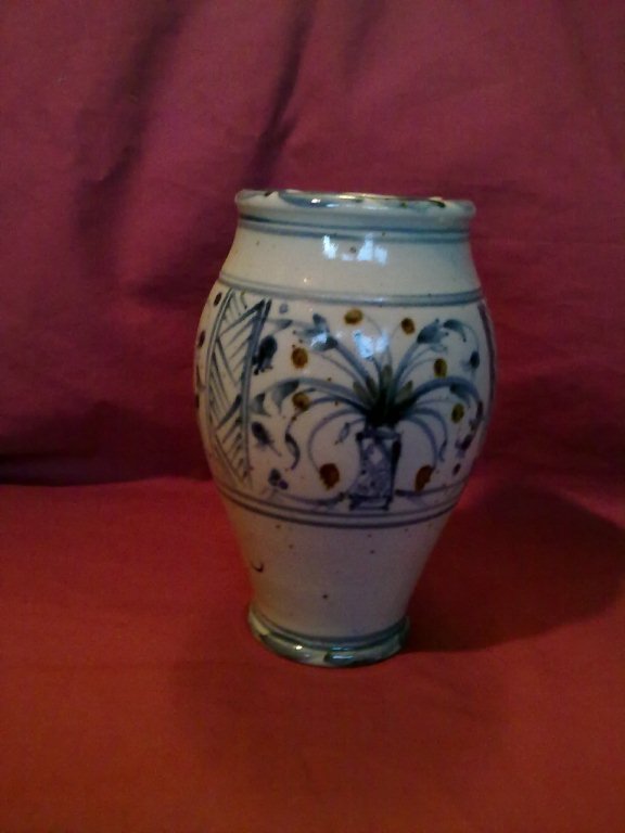 Preview of the first image of Hand decorated clay Vase.