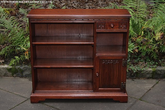 Preview of the first image of OLD CHARM TUDOR BROWN OAK BOOKCASE SHELVES CABINET CUPBOARD.