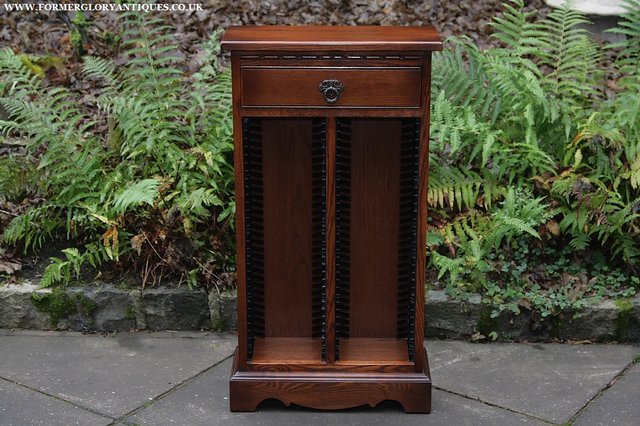 Preview of the first image of OLD CHARM JAYCEE TUDOR BROWN OAK DVD DISC CABINET CUPBOARD.