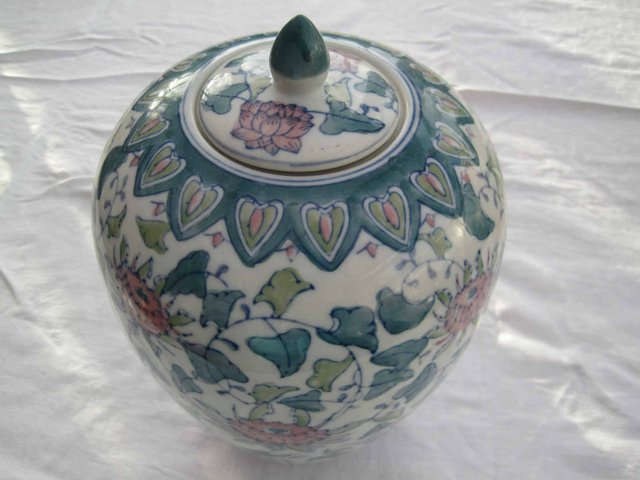 Preview of the first image of Large Pot with matching lid.