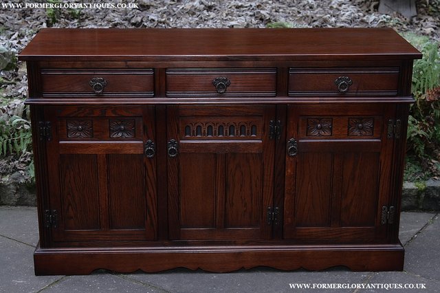 Preview of the first image of OLD CHARM TUDOR OAK DRESSER BASE SIDEBOARD CABINET CUPBOARD.