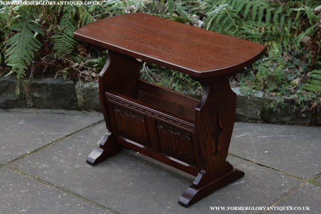 Preview of the first image of OLD CHARM TUDOR BROWN OAK MAGAZINE RACK COFFEE LAMP TABLE.
