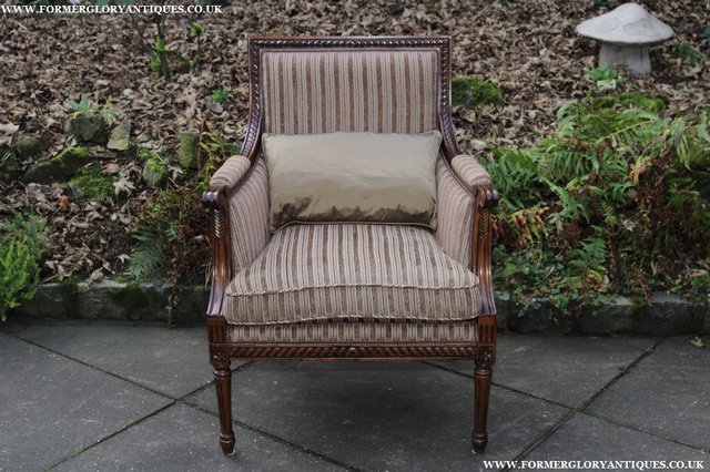 Image 2 of A FRENCH LOUIS MAHOGANY STYLE UPHOLSERED READING ARMCHAIR.