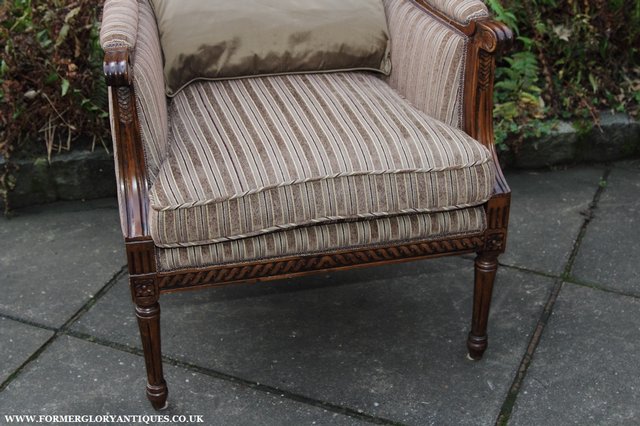 Image 3 of A FRENCH LOUIS MAHOGANY STYLE UPHOLSERED READING ARMCHAIR.