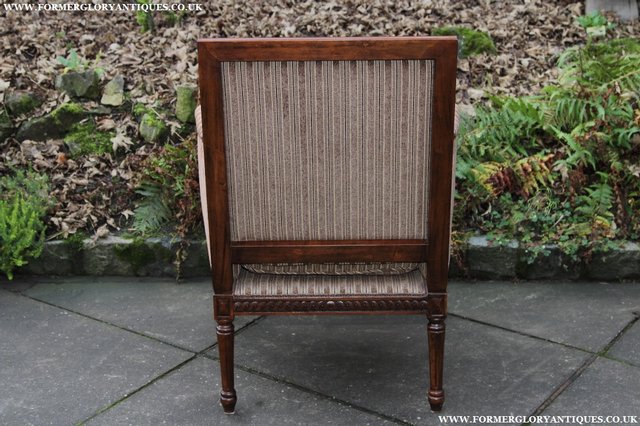 Image 6 of A FRENCH LOUIS MAHOGANY STYLE UPHOLSERED READING ARMCHAIR.