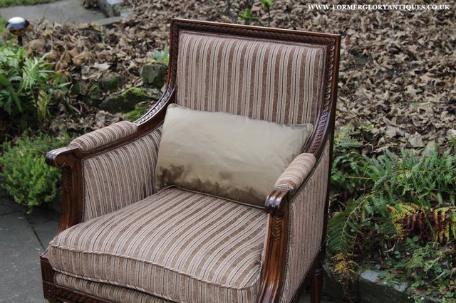 Image 8 of A FRENCH LOUIS MAHOGANY STYLE UPHOLSERED READING ARMCHAIR.
