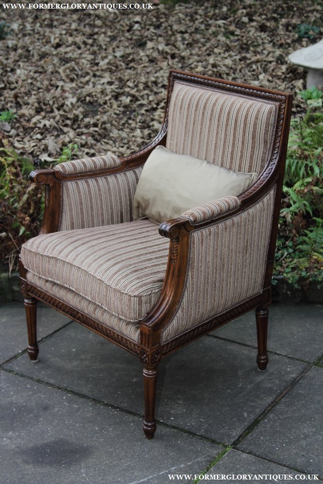 Image 16 of A FRENCH LOUIS MAHOGANY STYLE UPHOLSERED READING ARMCHAIR.