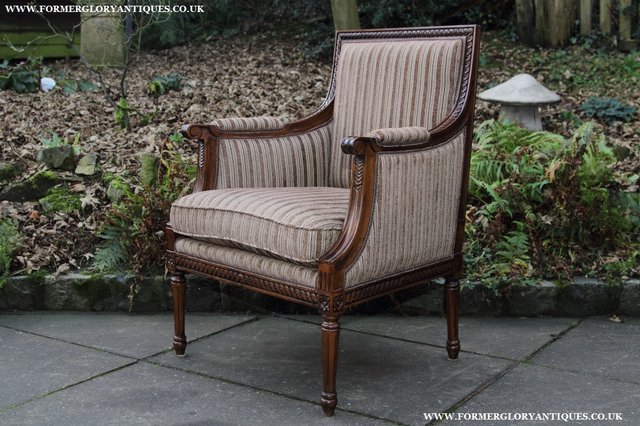 Image 25 of A FRENCH LOUIS MAHOGANY STYLE UPHOLSERED READING ARMCHAIR.