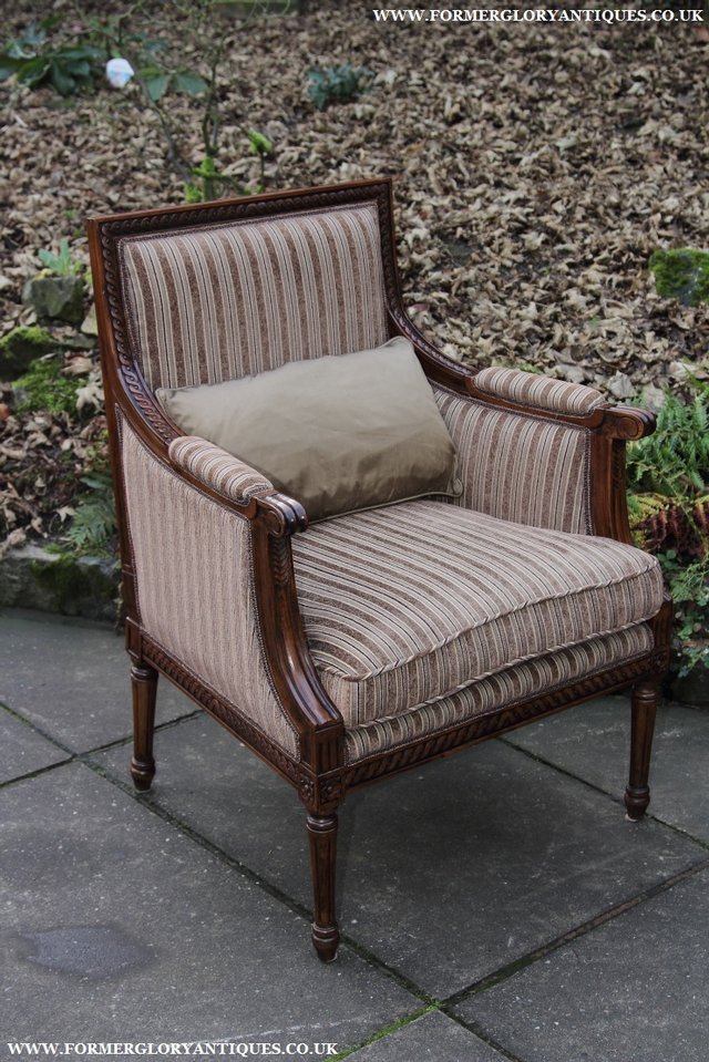 Image 30 of A FRENCH LOUIS MAHOGANY STYLE UPHOLSERED READING ARMCHAIR.