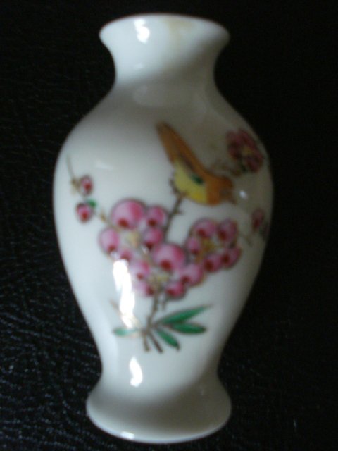 Preview of the first image of SMALL WHITE CHINESE VASE WITH BIRD & FLOWERS DESIGN.