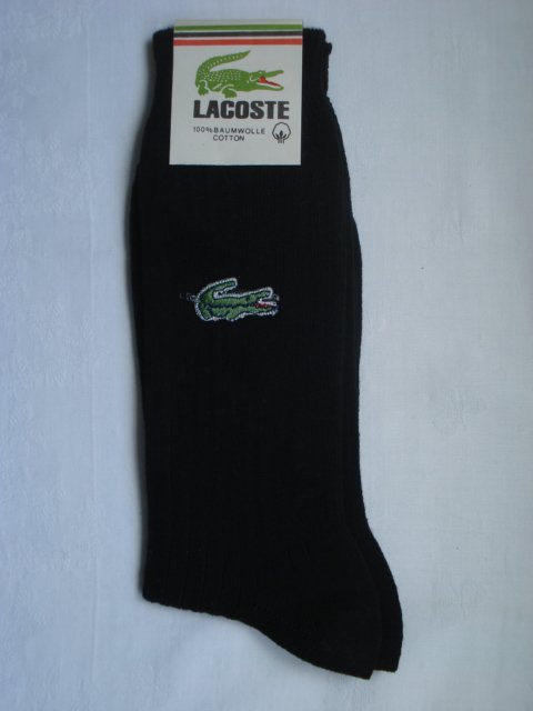 Preview of the first image of NEW PAIR OF MENS NOVELTY BLACK SOCKS.
