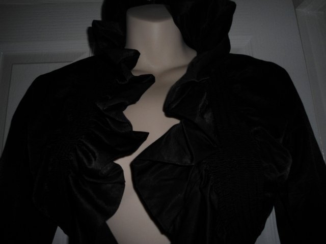 Preview of the first image of Black Evening Frilly Jacket S 8-10 or small 12 NEVER WORN.