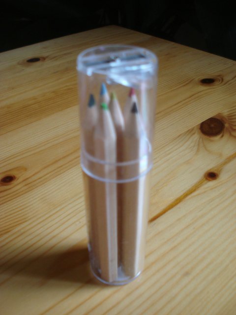Preview of the first image of NEW 6 COLOURED PENCILS/CRAYONS IN TUBE WITH PENCIL SHARPENER.