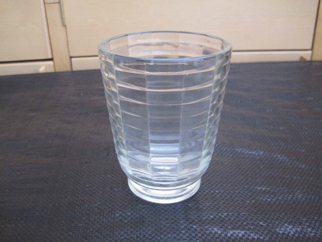 Preview of the first image of Vintage Clear Glass Tumbler Vase.