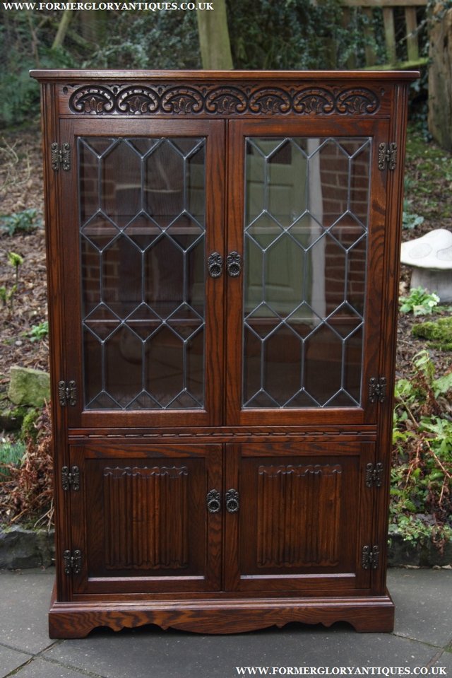 Preview of the first image of OLD CHARM TUDOR BROWN OAK BOOKCASE SHELVES DISPLAY CABINET.