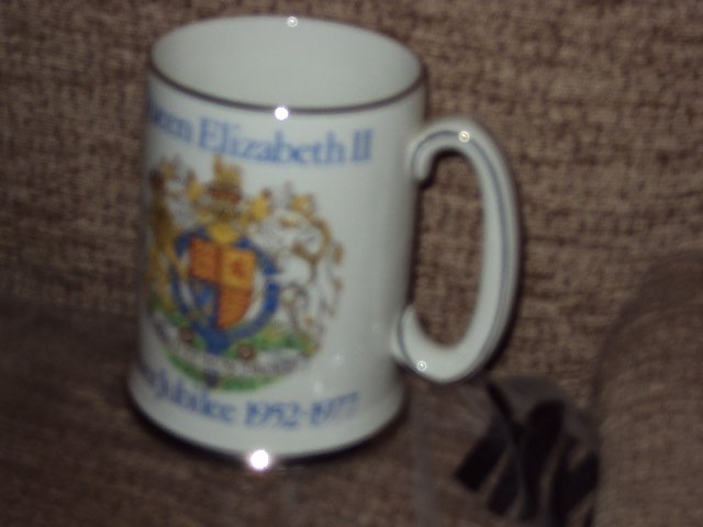 Preview of the first image of QUEEN ELIZABETH 2ND SILVER JUBILEE TANKARD+CHARLES+DIANA MUG.