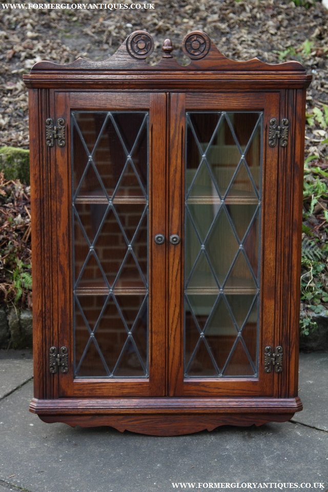 Preview of the first image of OLD CHARM OAK TUDOR BROWN CORNER DISPLAY CABINET CUPBOARD.
